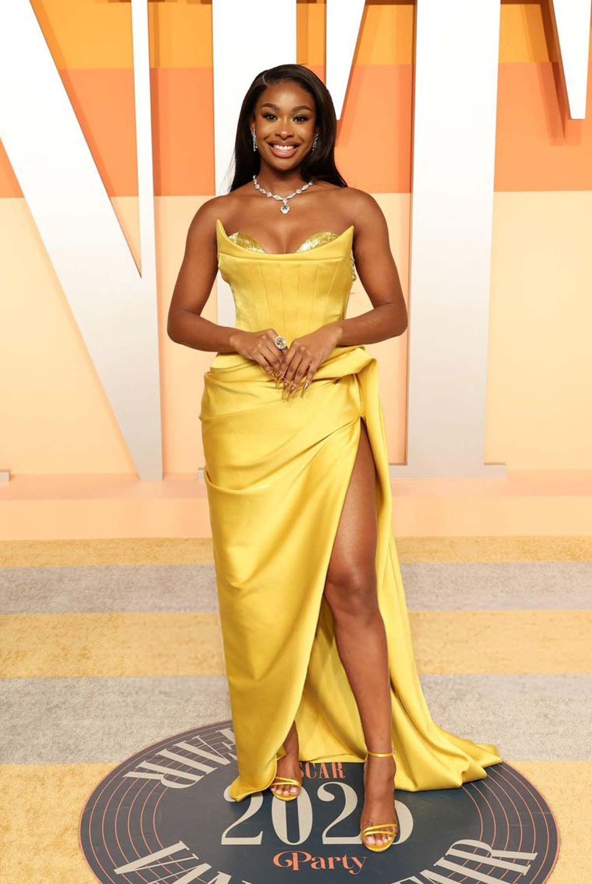 Coco Jones bright gold 2025 strapless Vanity fair party dress