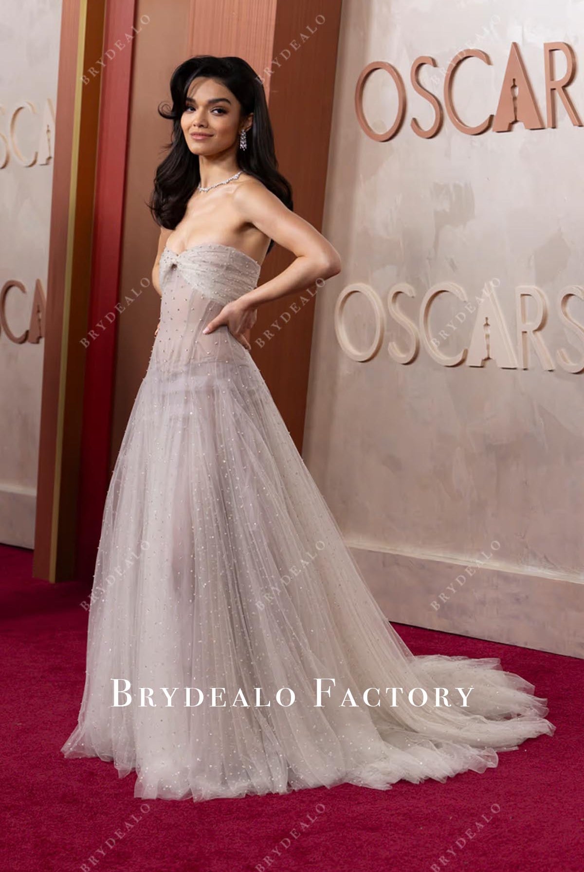 Rachel Zegler grey strapless 2025 Oscars red carpet dress
