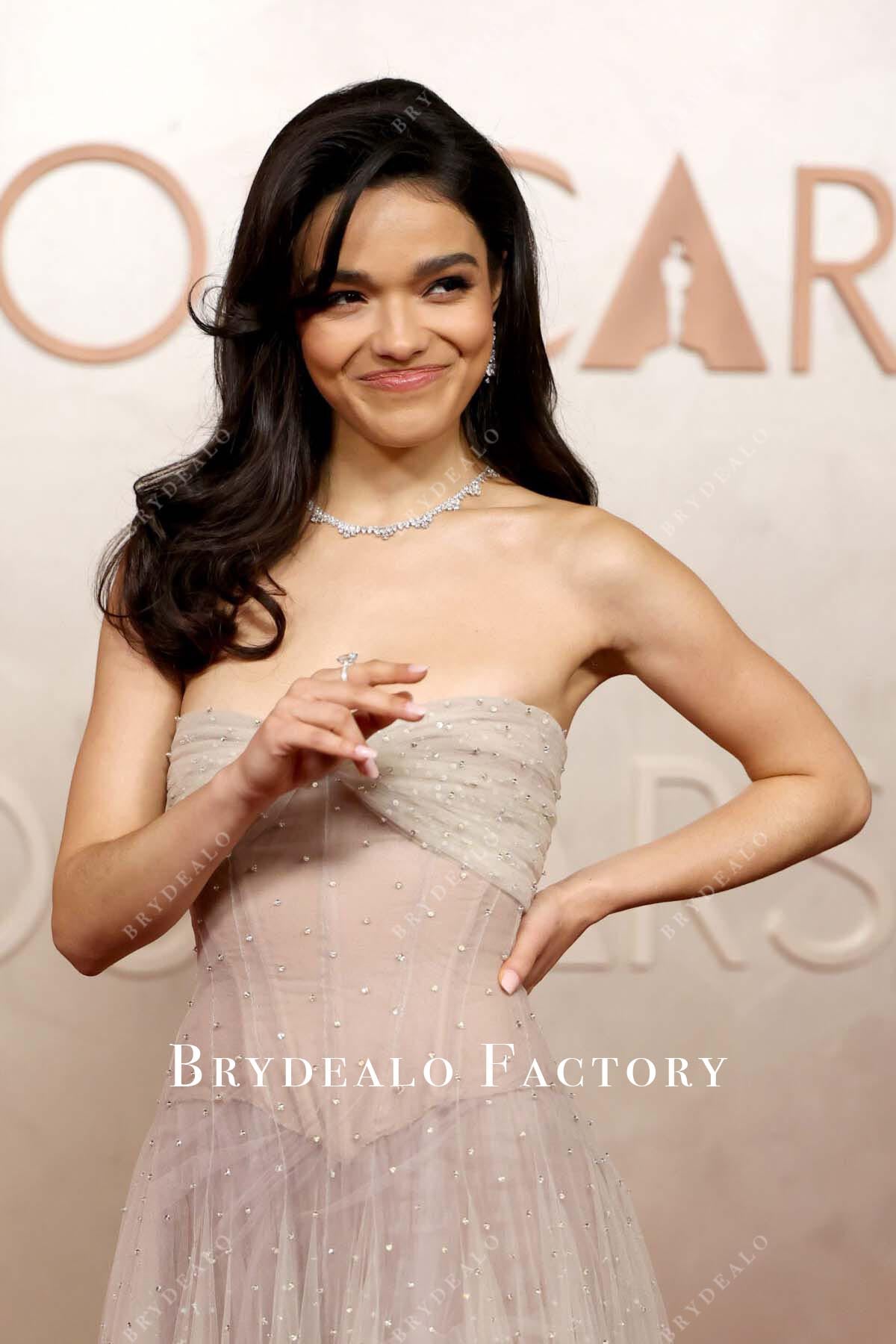 Rachel Zegler semi sweetheart neck 2025 Oscars red carpet dress