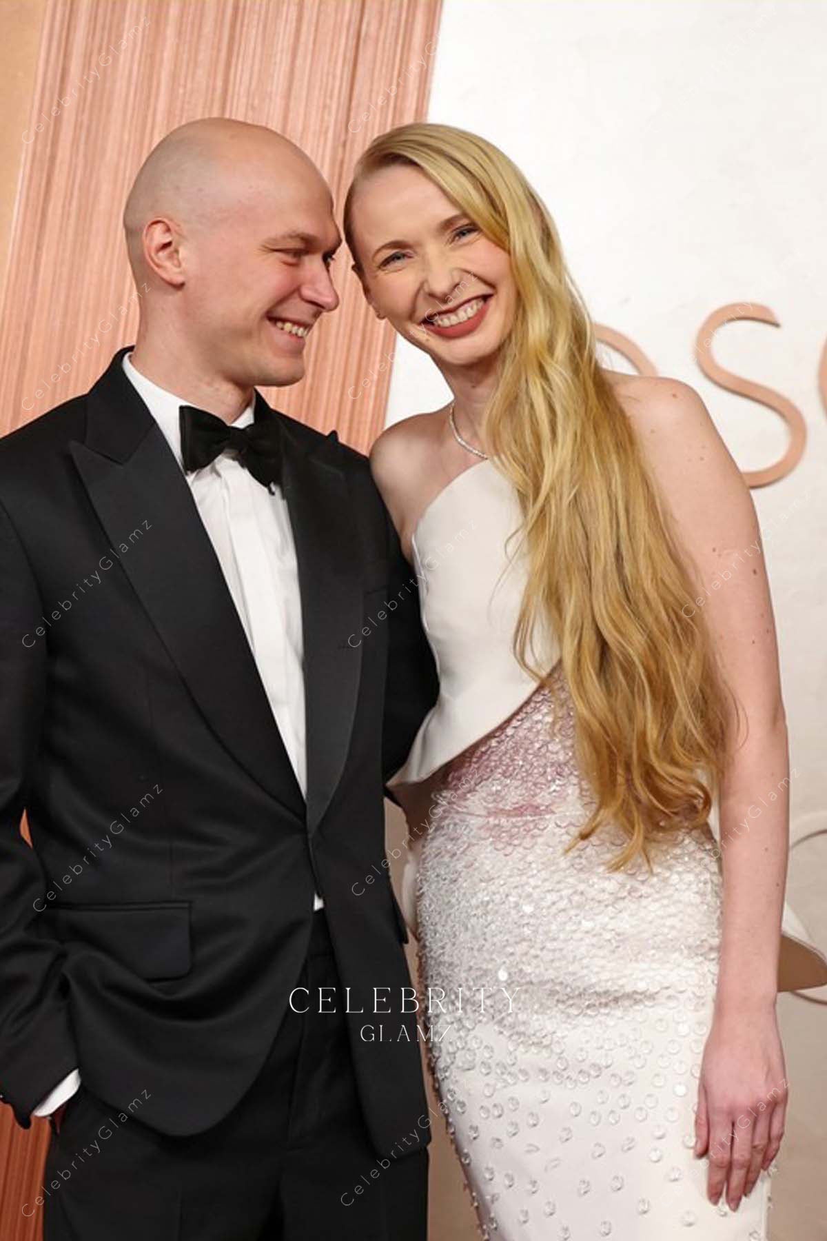 Anna Shevchuk white 2025 asymmetric neck Oscars red carpet dress