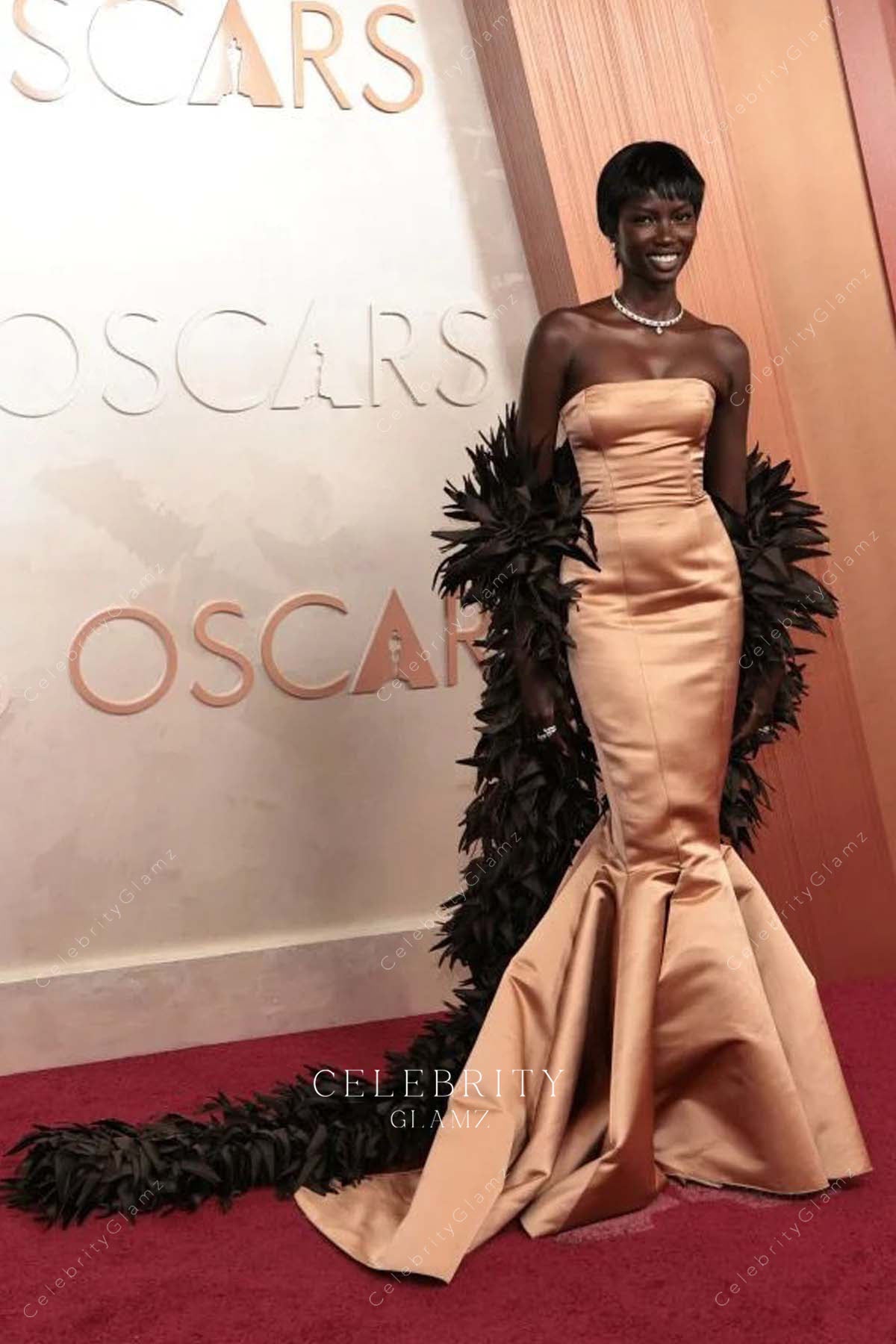 Anok Yai trumpet prom dress 2025 Oscars red carpet