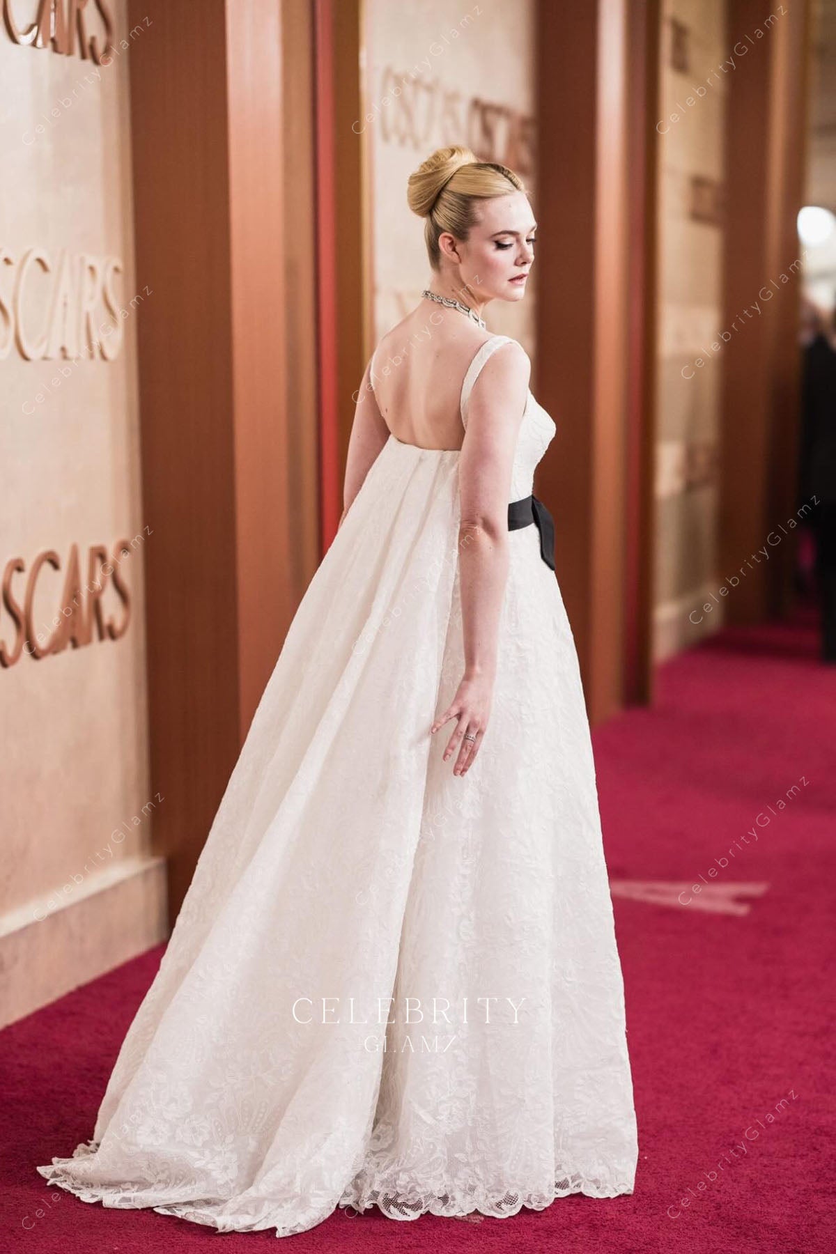 backless Elle Fanning 2025 Oscars red carpet dress