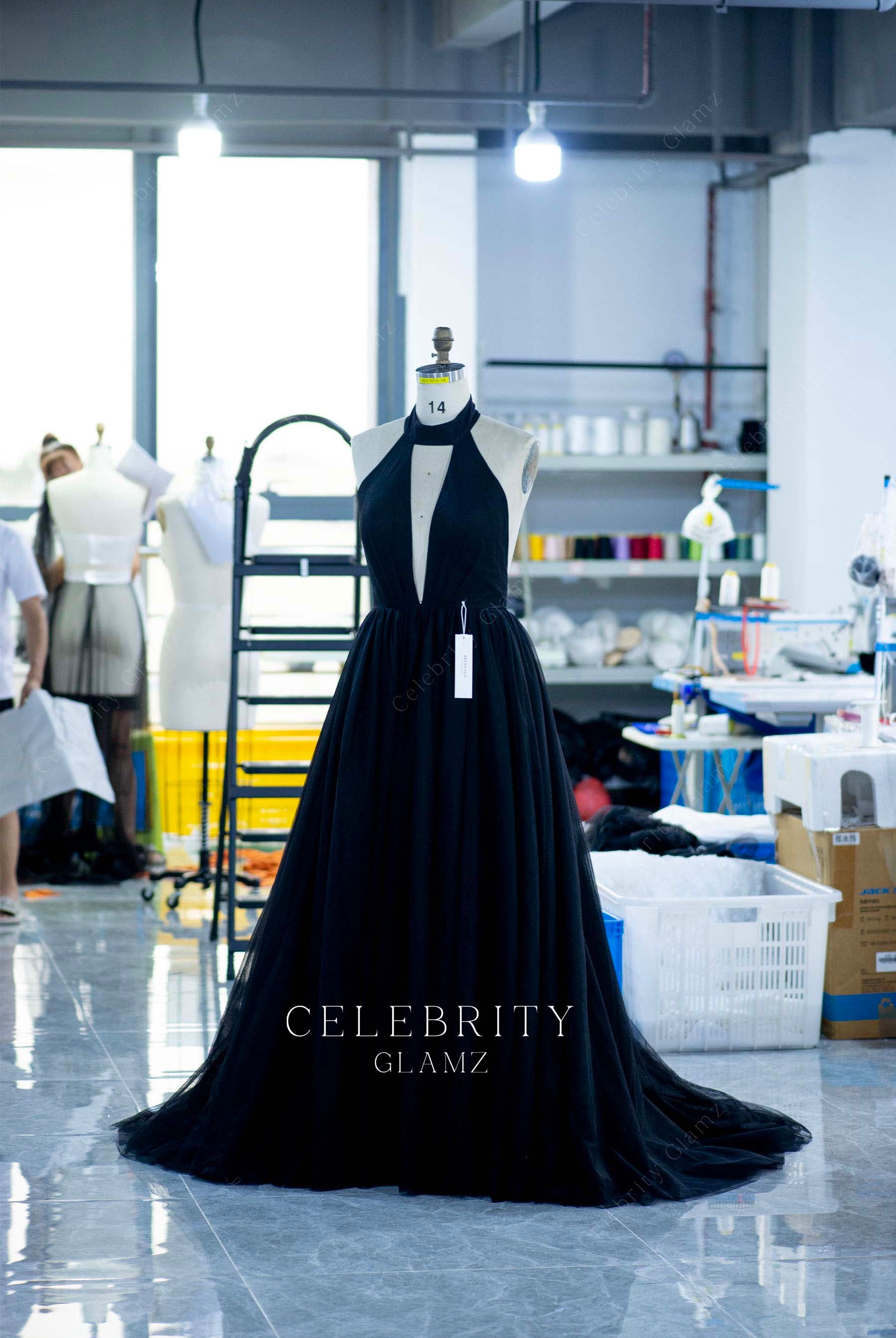 black puffy halter prom dress