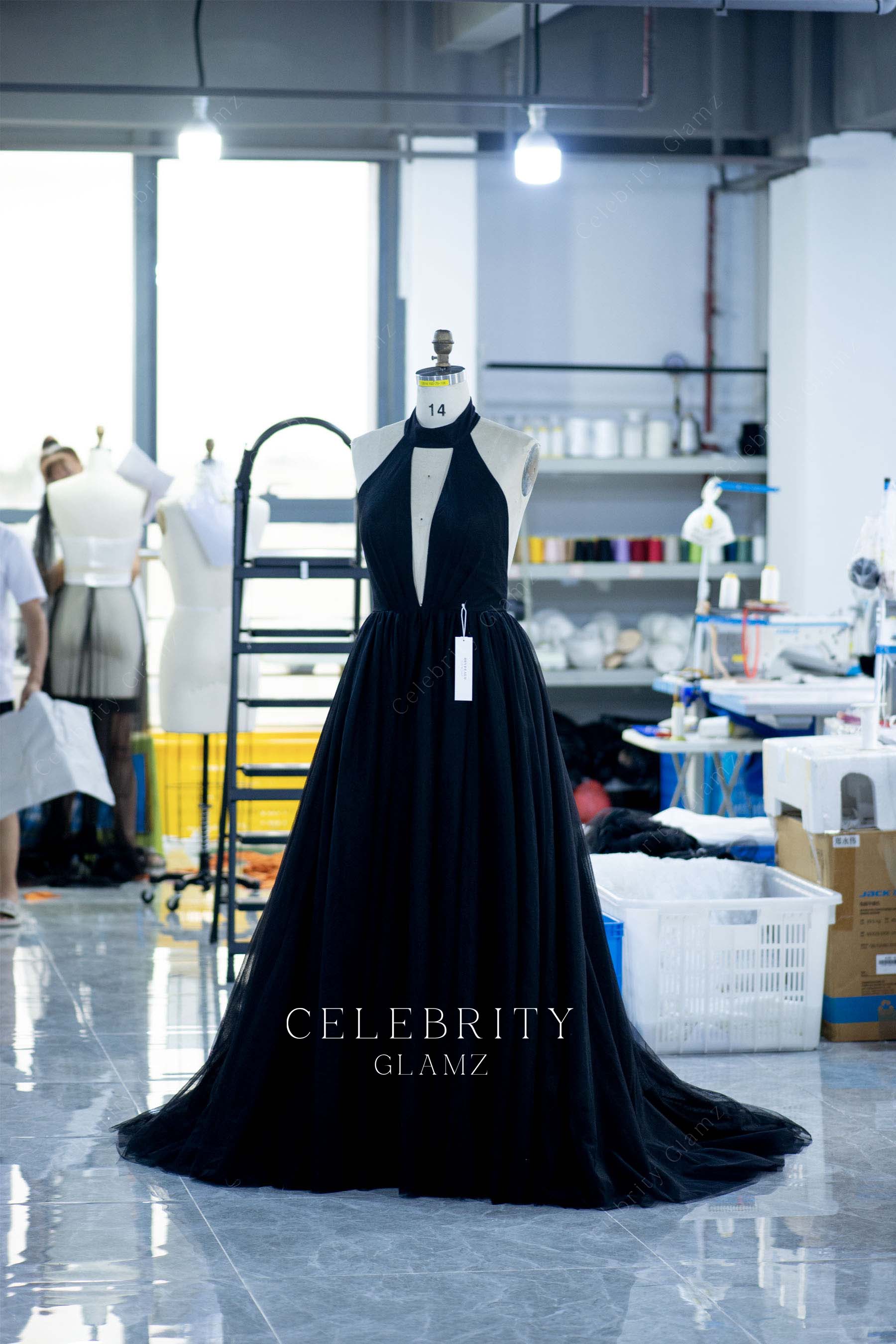 black puffy halter prom dress