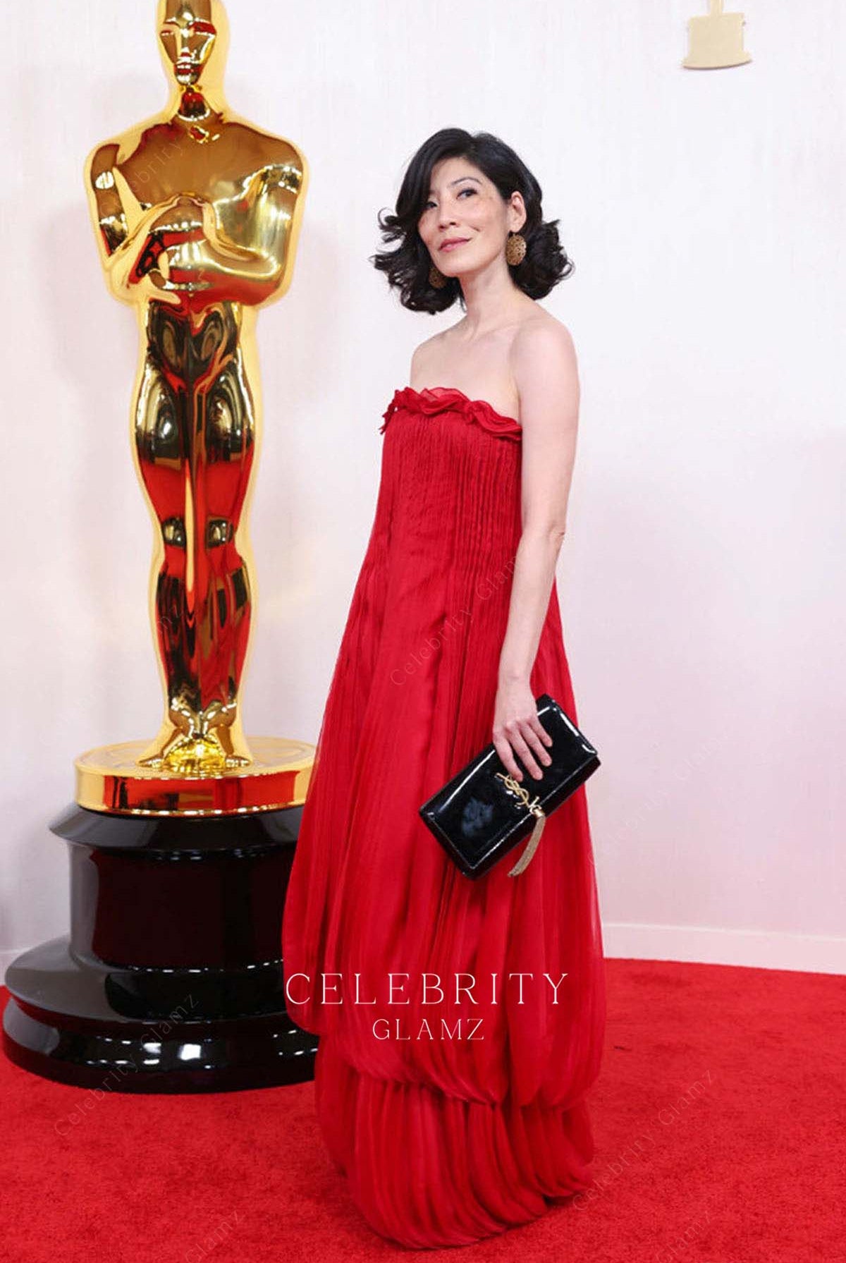 Brenda Hsueh red strapless dress 2024 Oscars red carpet