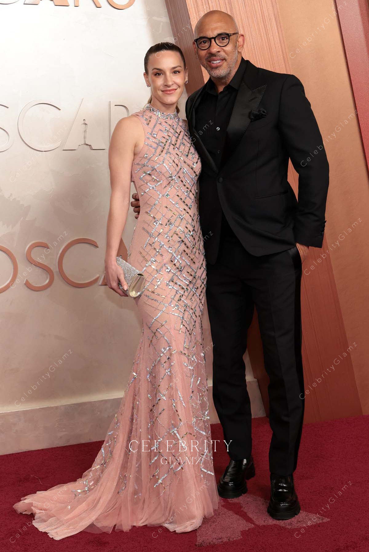 Britt Burton pink 2025 Oscars red carpet court train dress