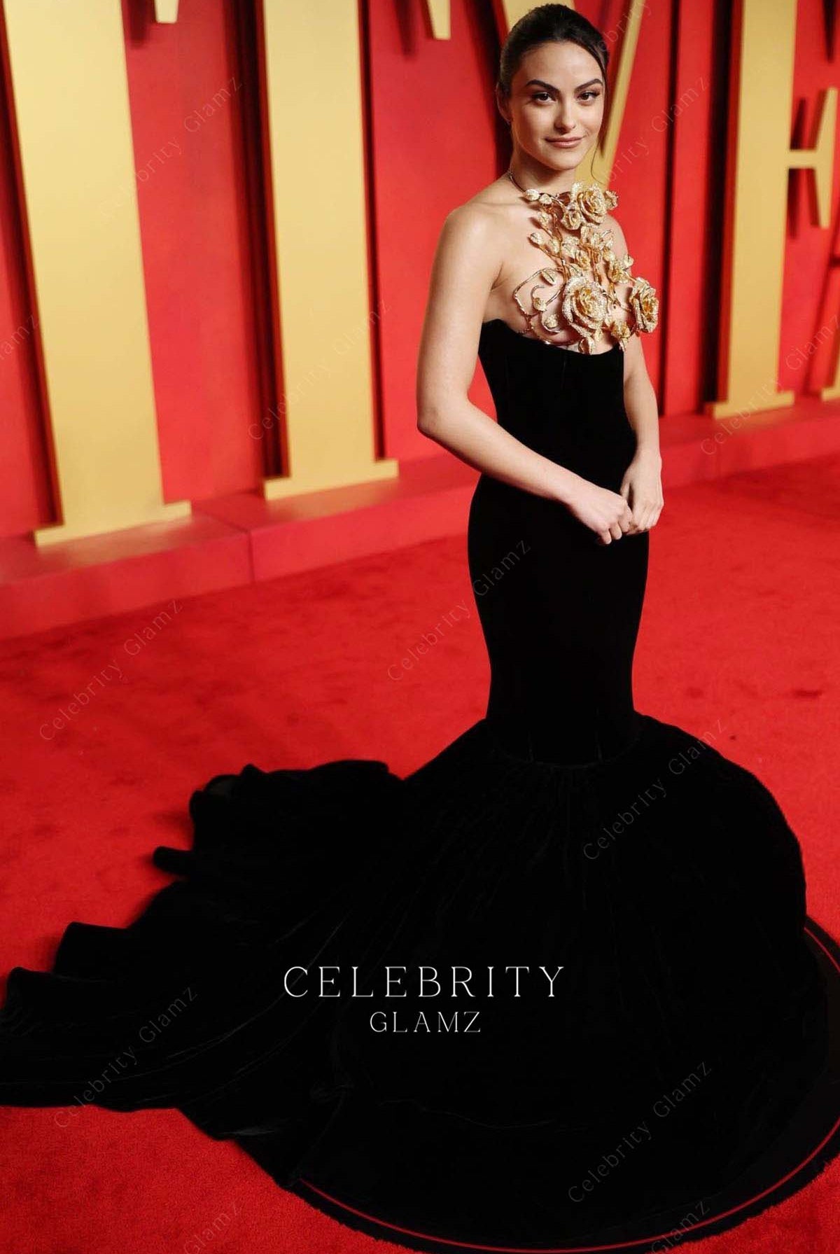 Camila Mendes black trumpet prom dress 2024 Oscars after party