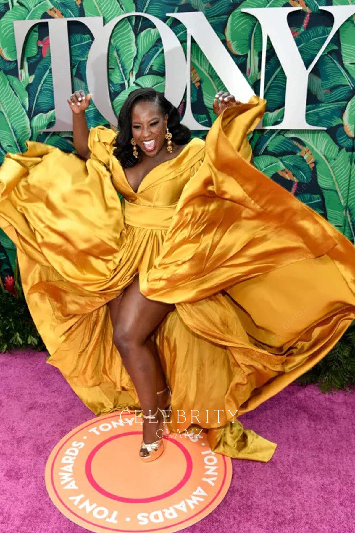 Crystal Lucas Perry golden high slit evening dress 76th tony awards