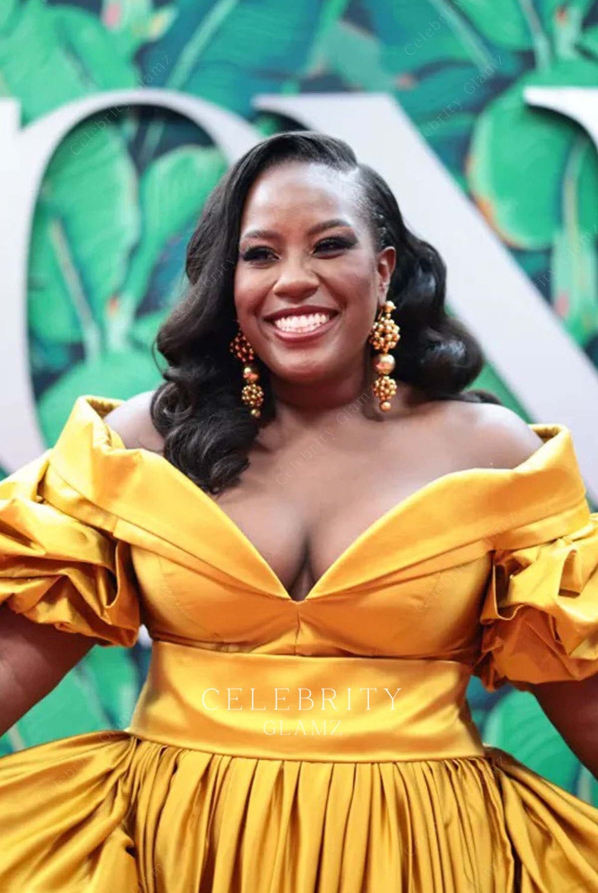 Crystal Lucas Perry golden v neck evening dress 76th tony awards