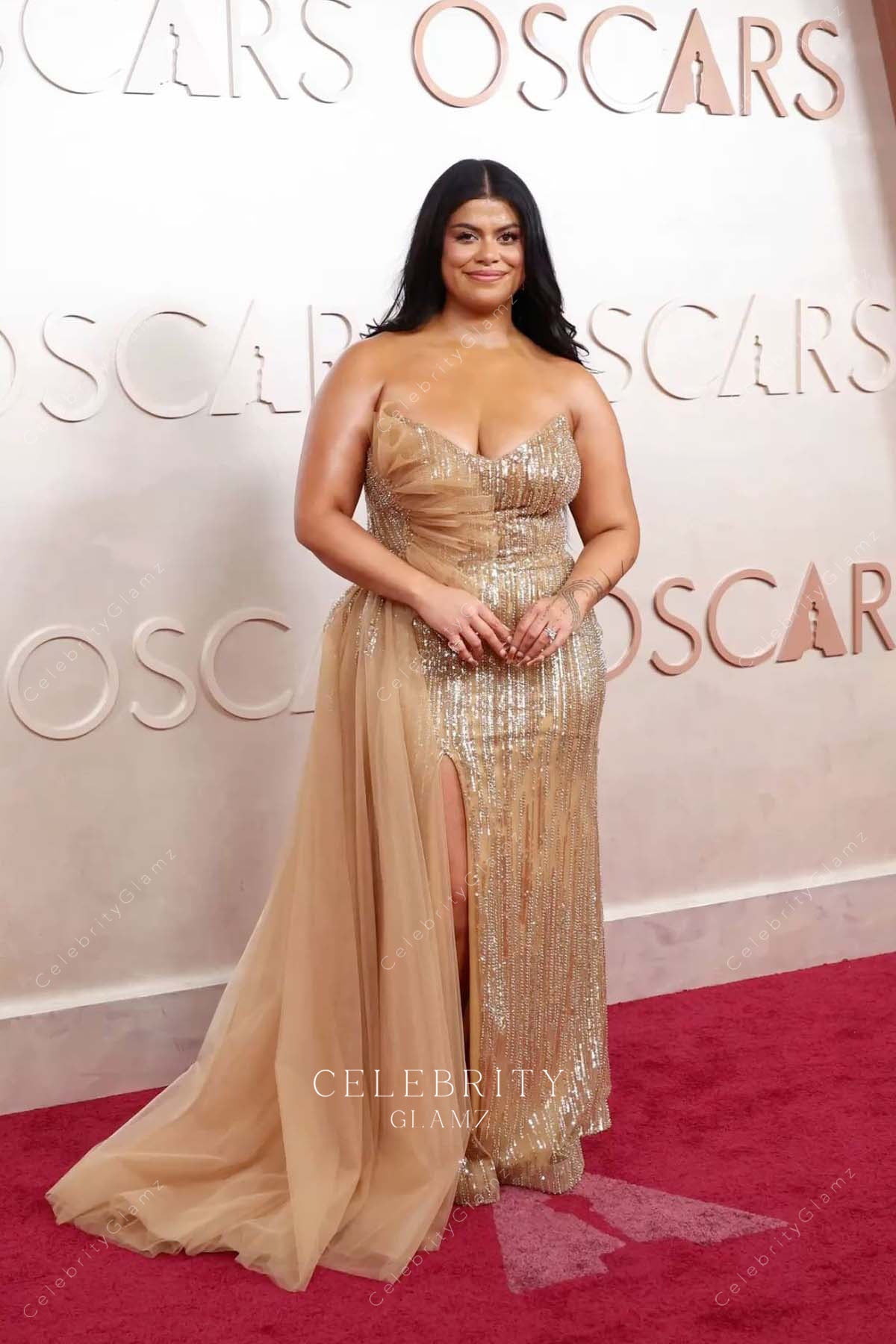 Drew Afualo 2025 Oscars red carpet flowing train dress