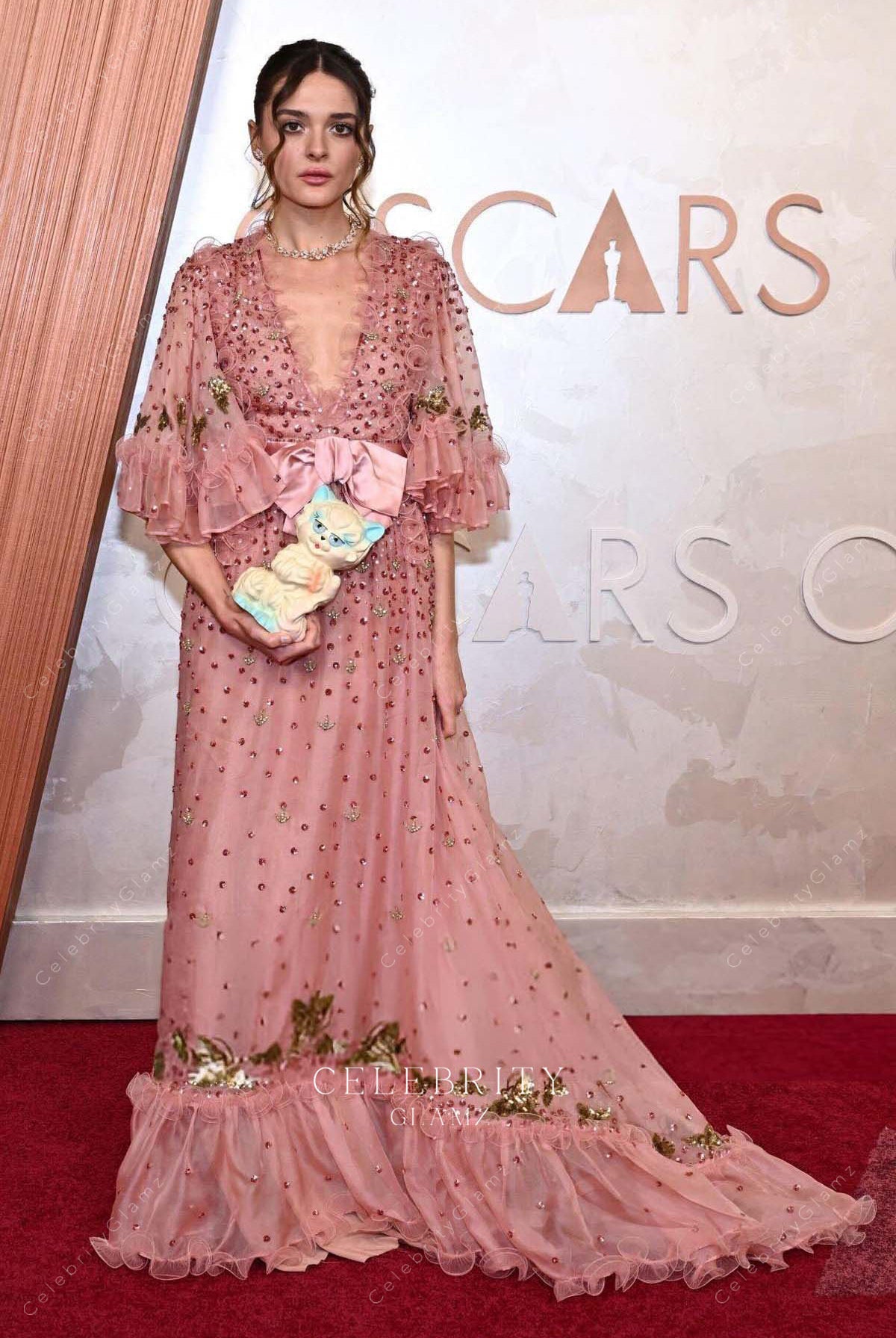 dusty rose Charlotte Lawrence 2025 Oscars tulle red carpet prom dress