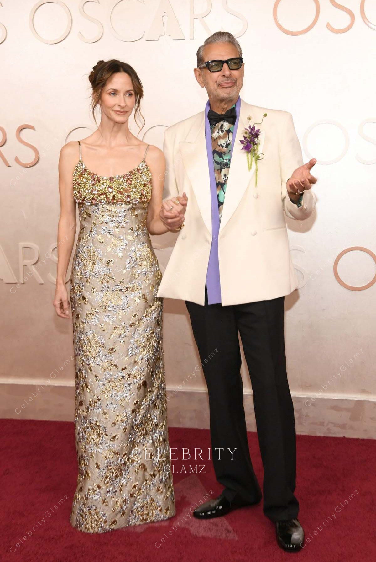 Emilie Livingston taupe scoop neck 2025 Oscars red carpet dress