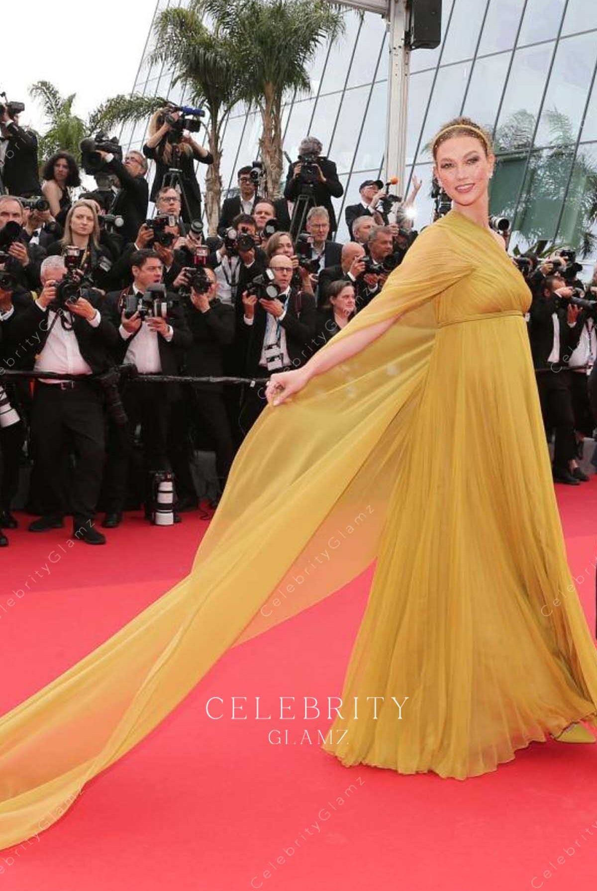 Karlie Kloss gold cape 2023 Cannes dress
