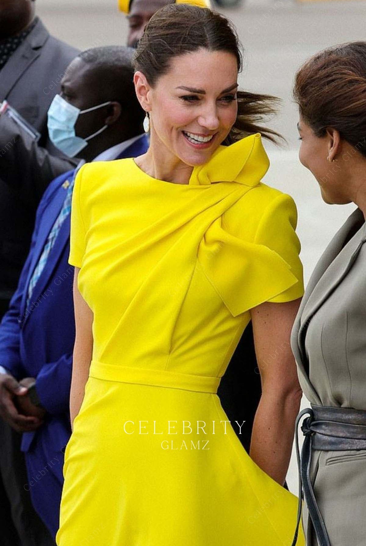 Kate chic yellow prom dress watching Wimbledon final