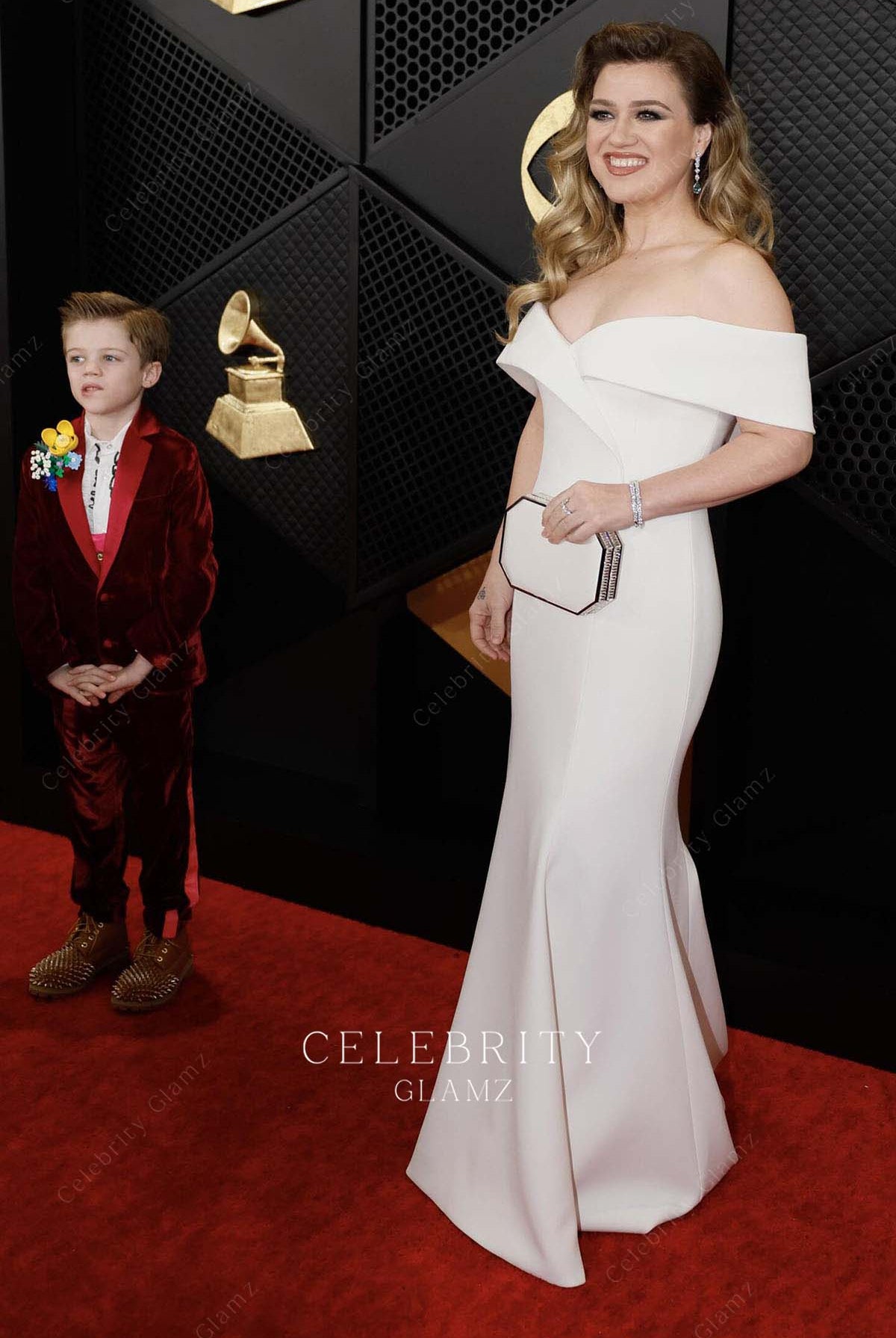 Kelly Clarkson off shoulder prom dress Grammys red carpet 2024