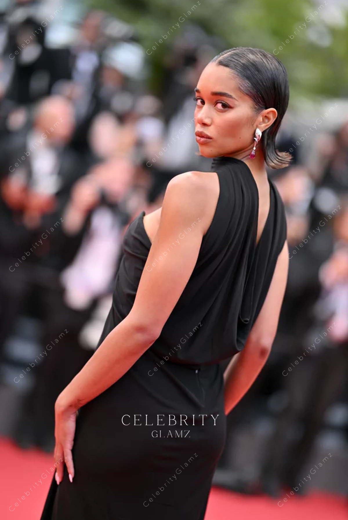 Laura Harrier cowl back dress 2023 Cannes film festival