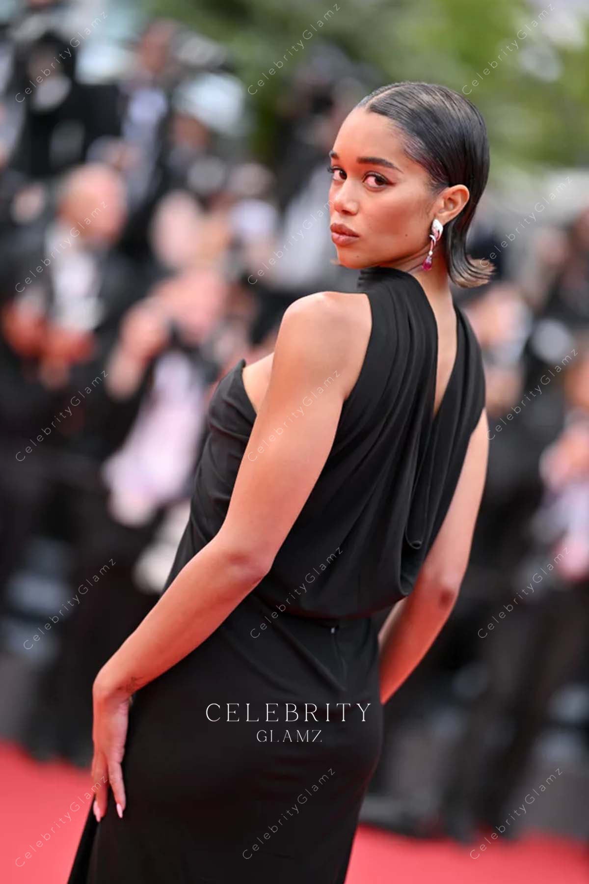 Laura Harrier cowl back dress 2023 Cannes film festival