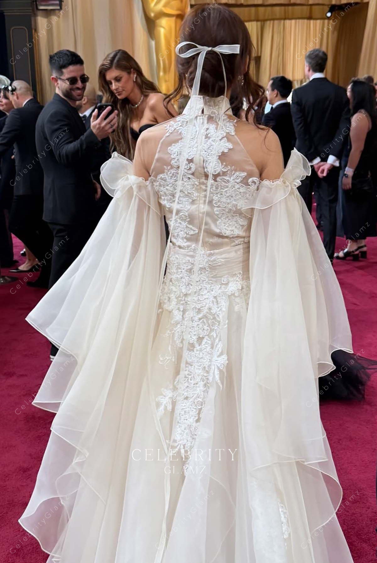 leendadong 2025 Oscars red carpet illusion lace back dress