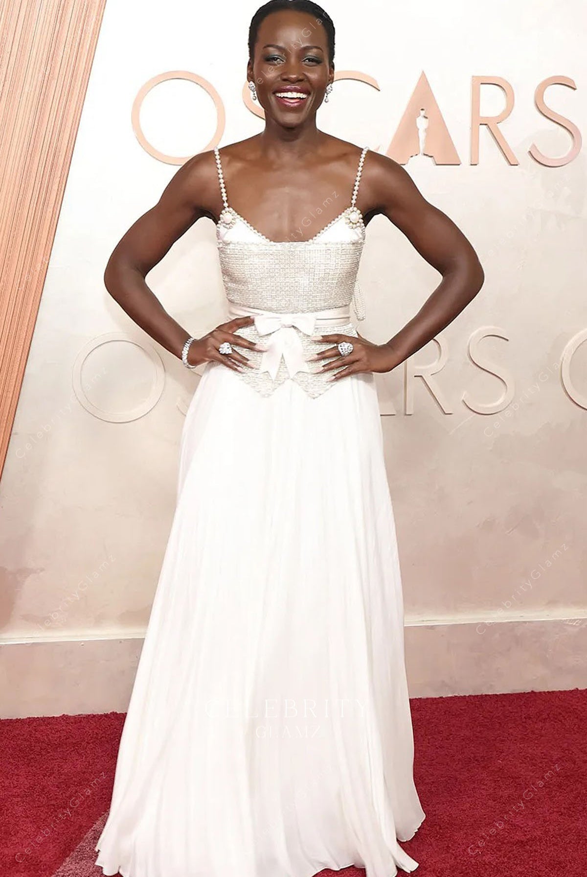 Lupita Nyong’o white floor length 2025 Oscars red carpet dress
