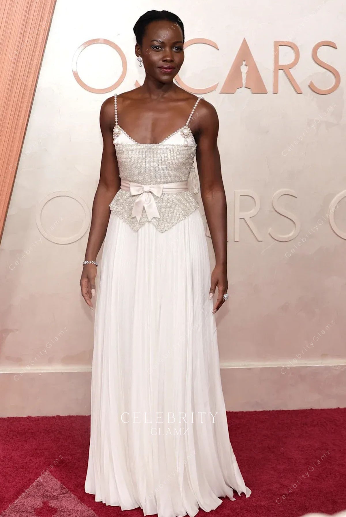 Lupita Nyong’o with waistband 2025 Oscars red carpet dress