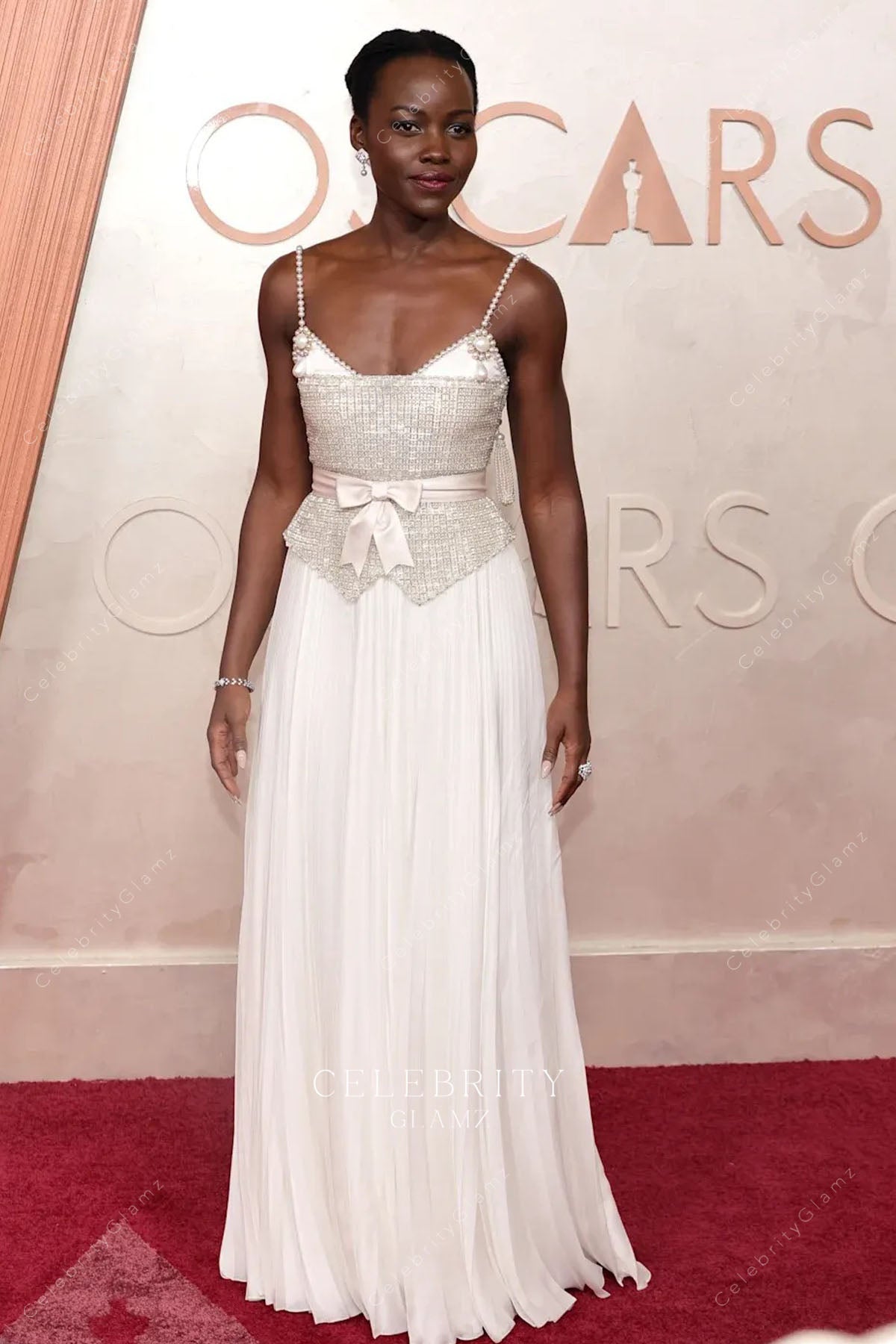 Lupita Nyong’o with waistband 2025 Oscars red carpet dress