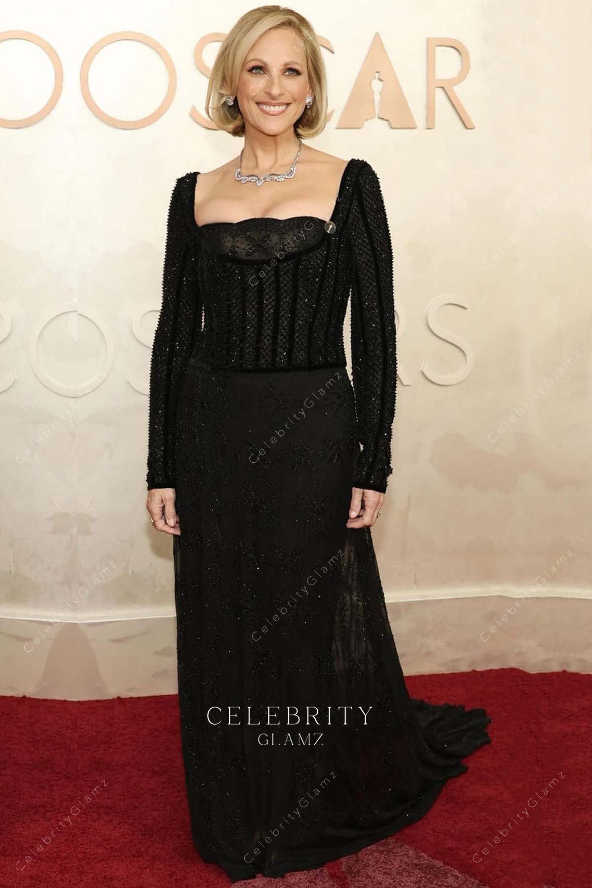 Marlee Matlin 2025 Oscars red carpet beaded bodice dress