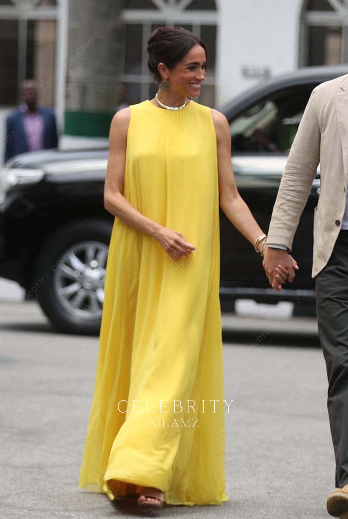 Meghan Markle 2024 Nigeria last day yellow sleeveless dress