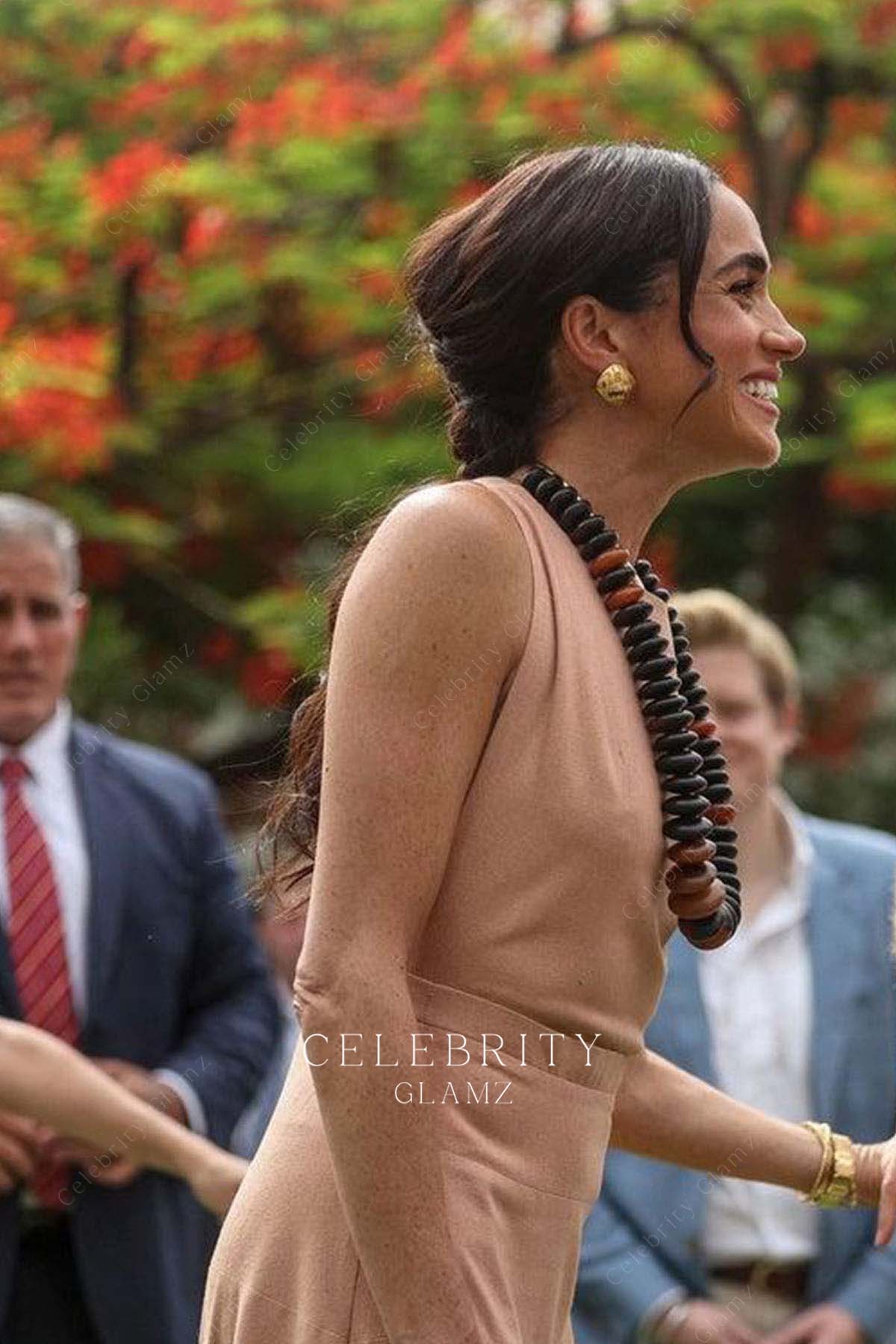 Meghan Markle elegant peach formal dress Nigeria champion the Invictus games 2024