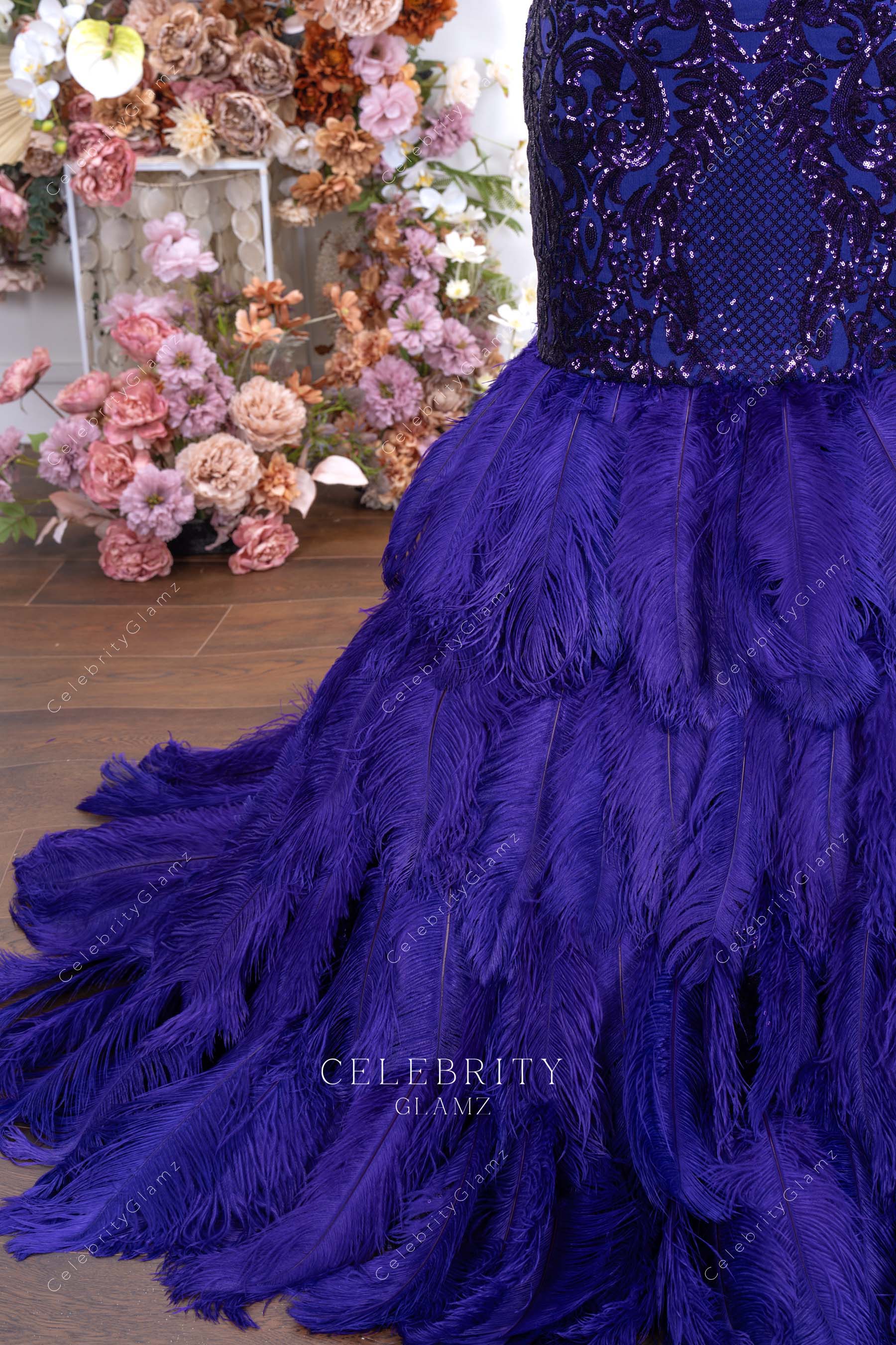 purple feathered trumpet prom dress