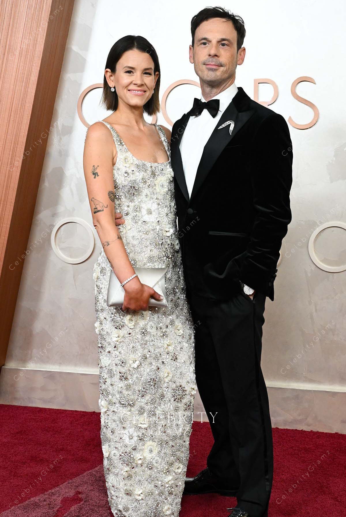 Shauna Robertson 2025 Oscars red carpet light sheath dress