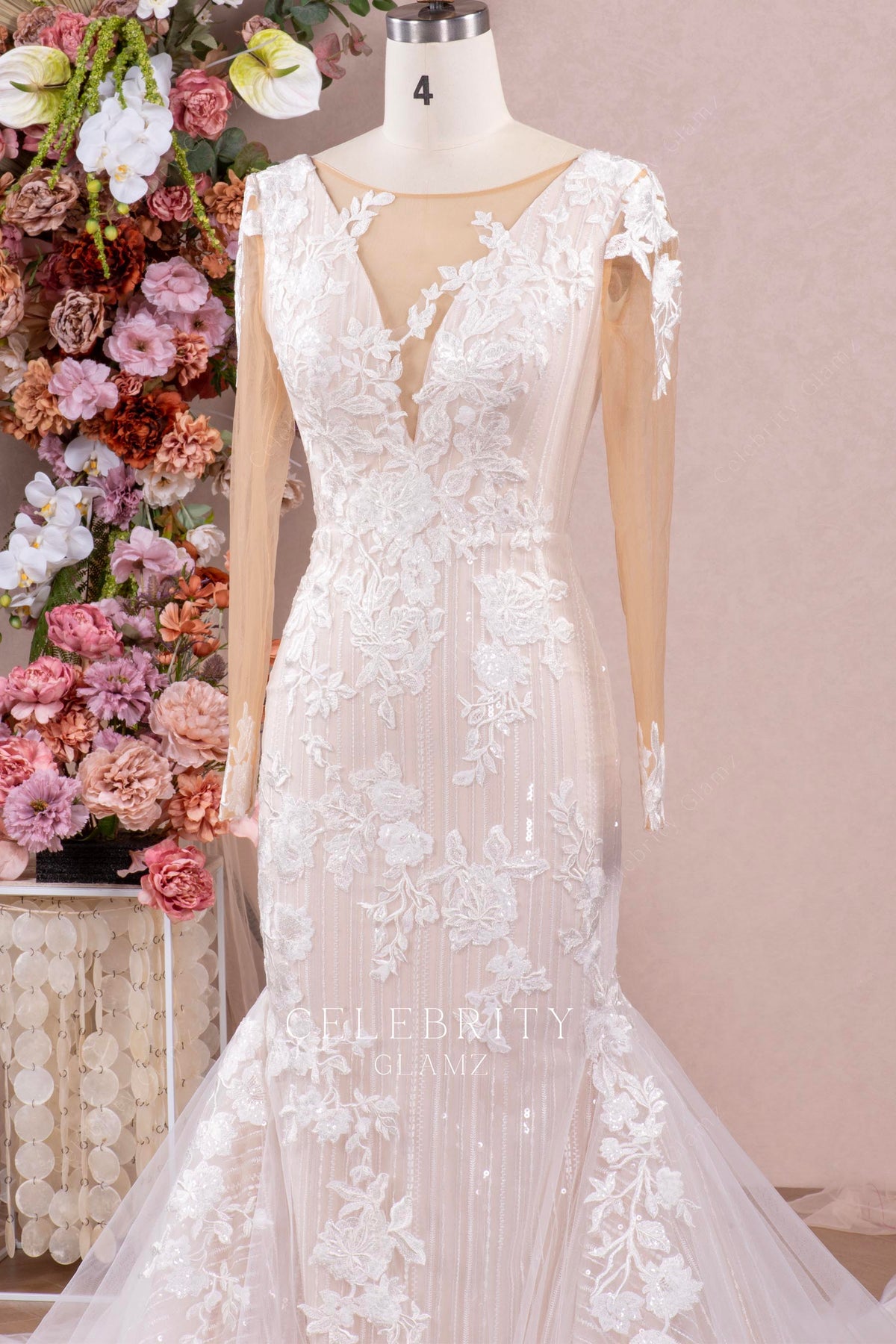 sheer plunging neck mermaid wedding dress