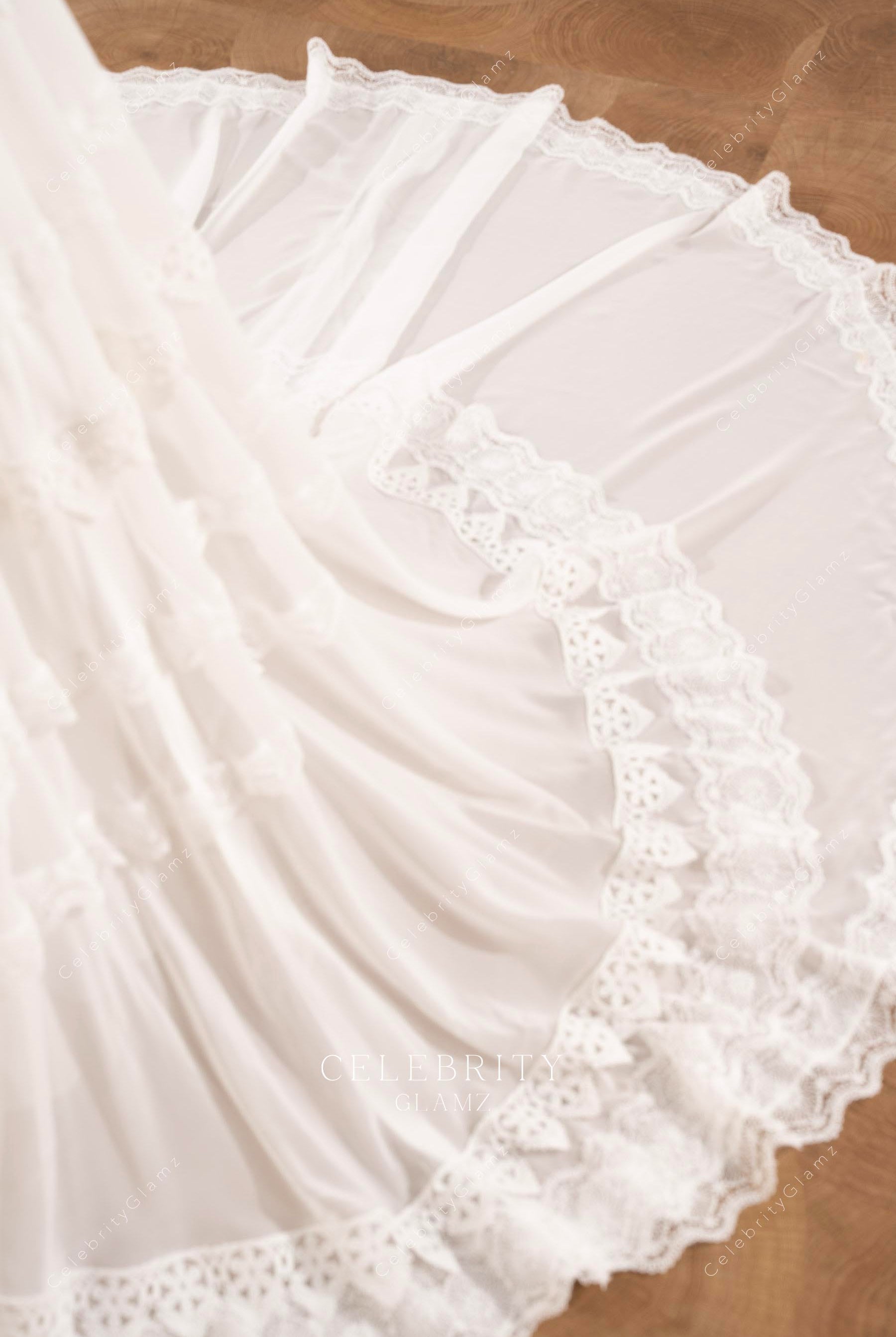 tiered long train wedding dress