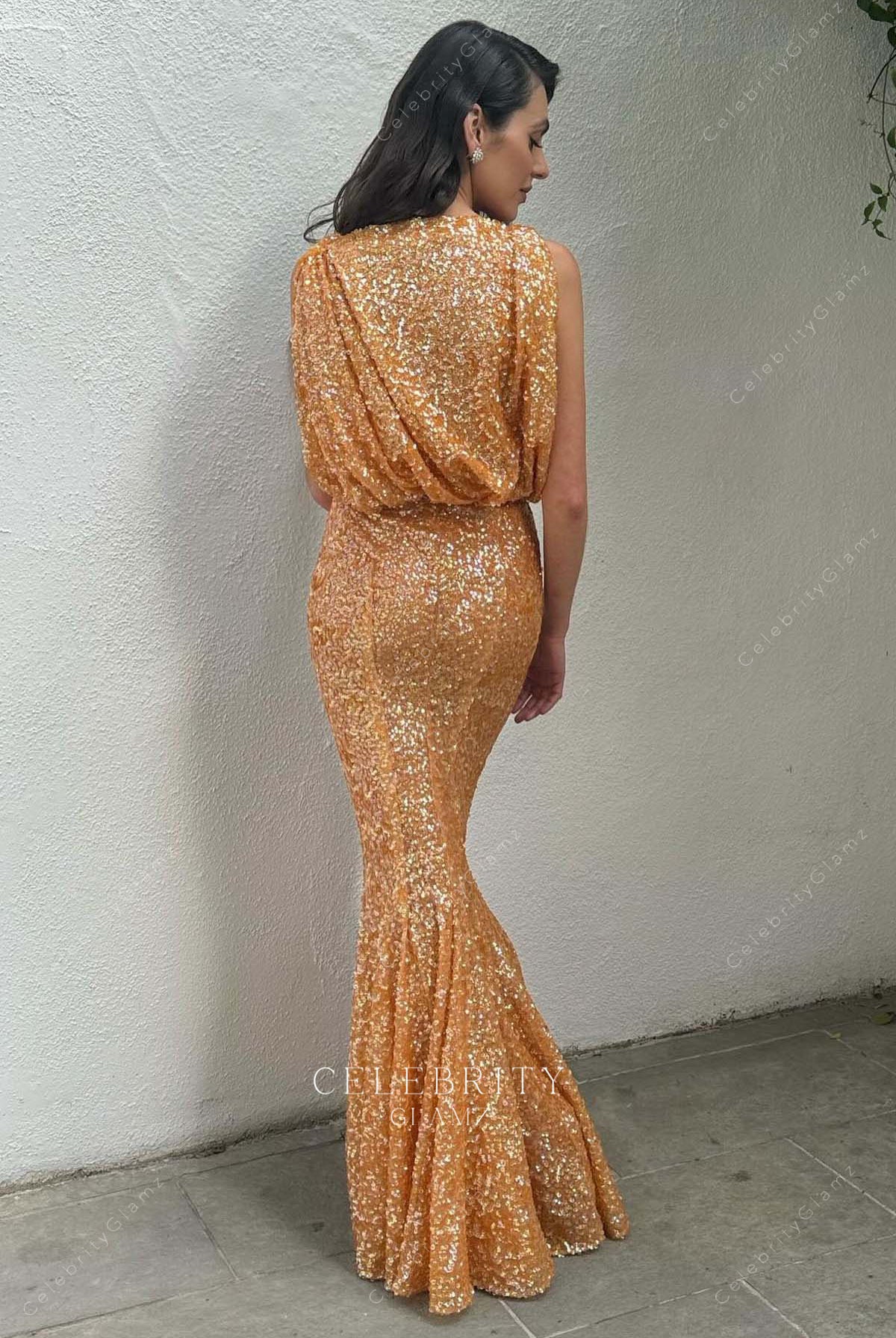 Vic Carmen Sonne trumpet 2025 Oscars red carpet formal dress