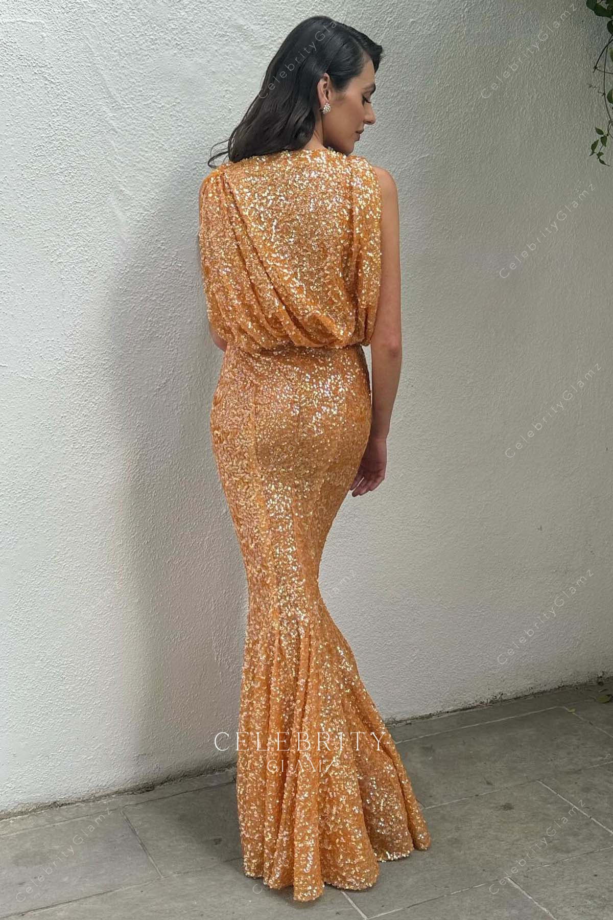 Vic Carmen Sonne trumpet 2025 Oscars red carpet formal dress