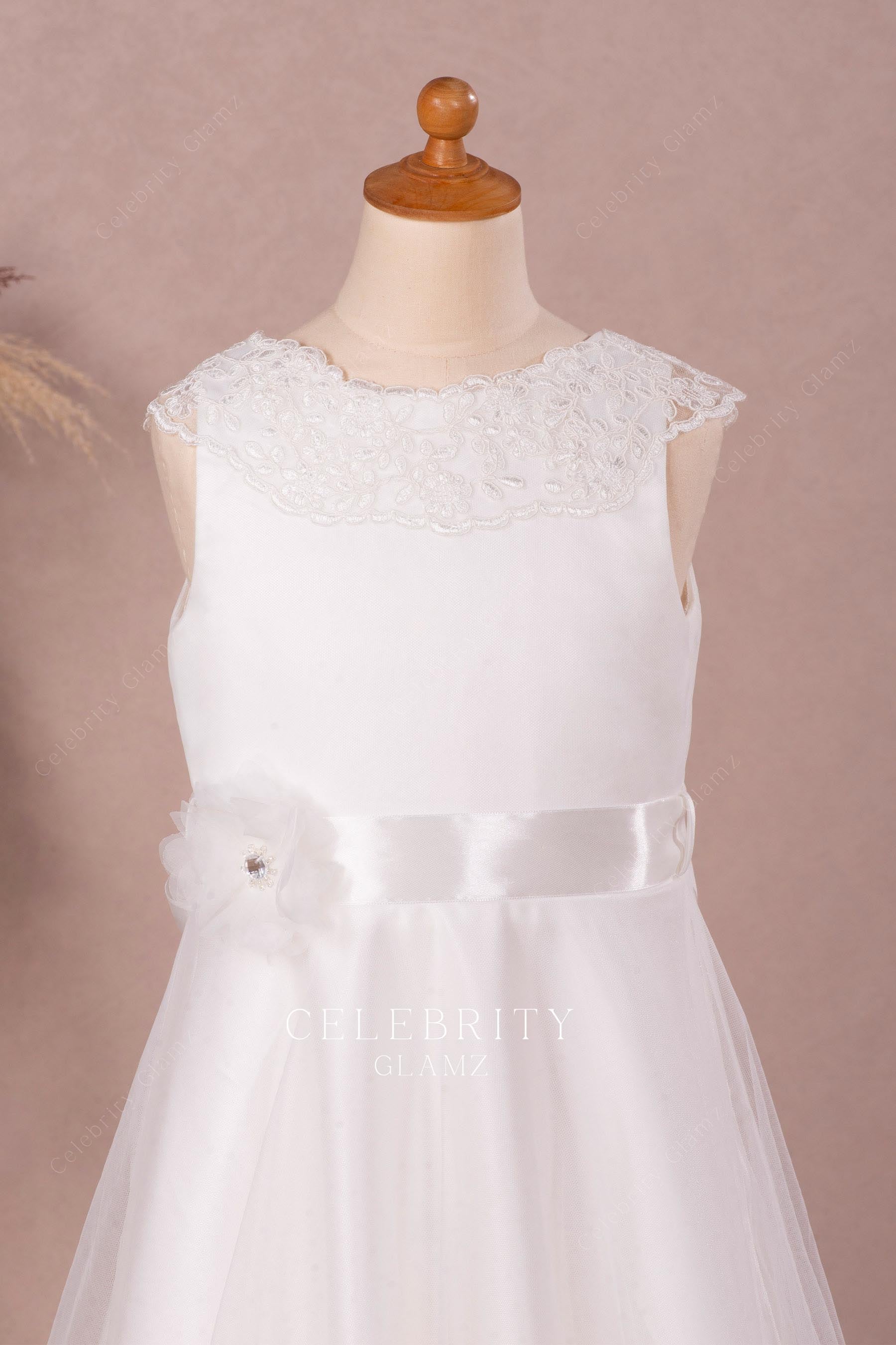 white satin sleeveless flower girl dress