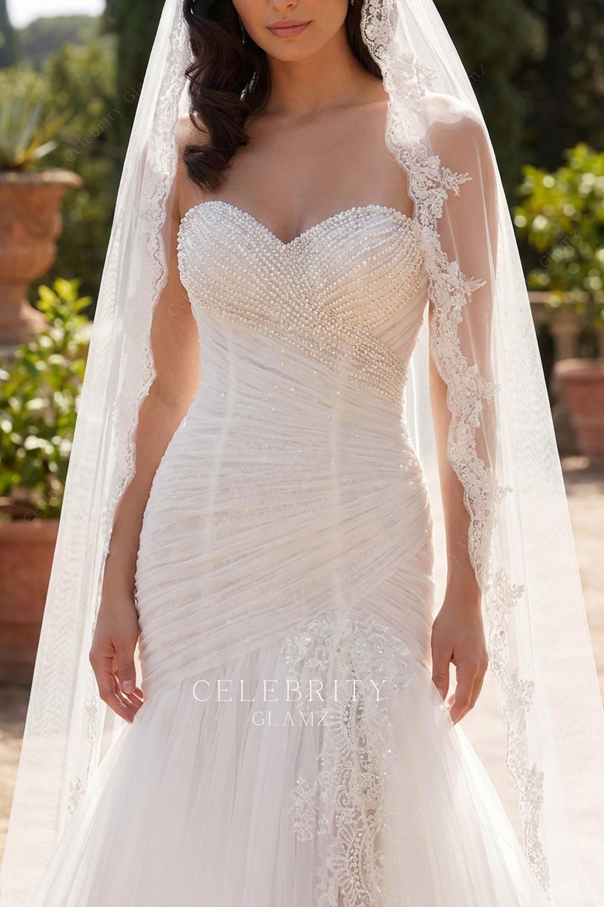 white strapless pleated bodice wedding dress
