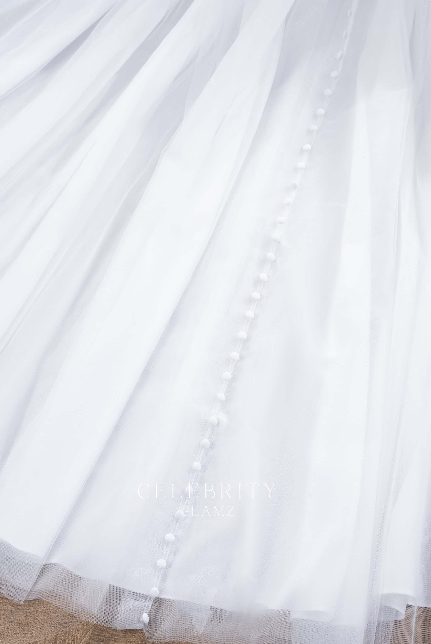 white tulle buttoned wedding dress