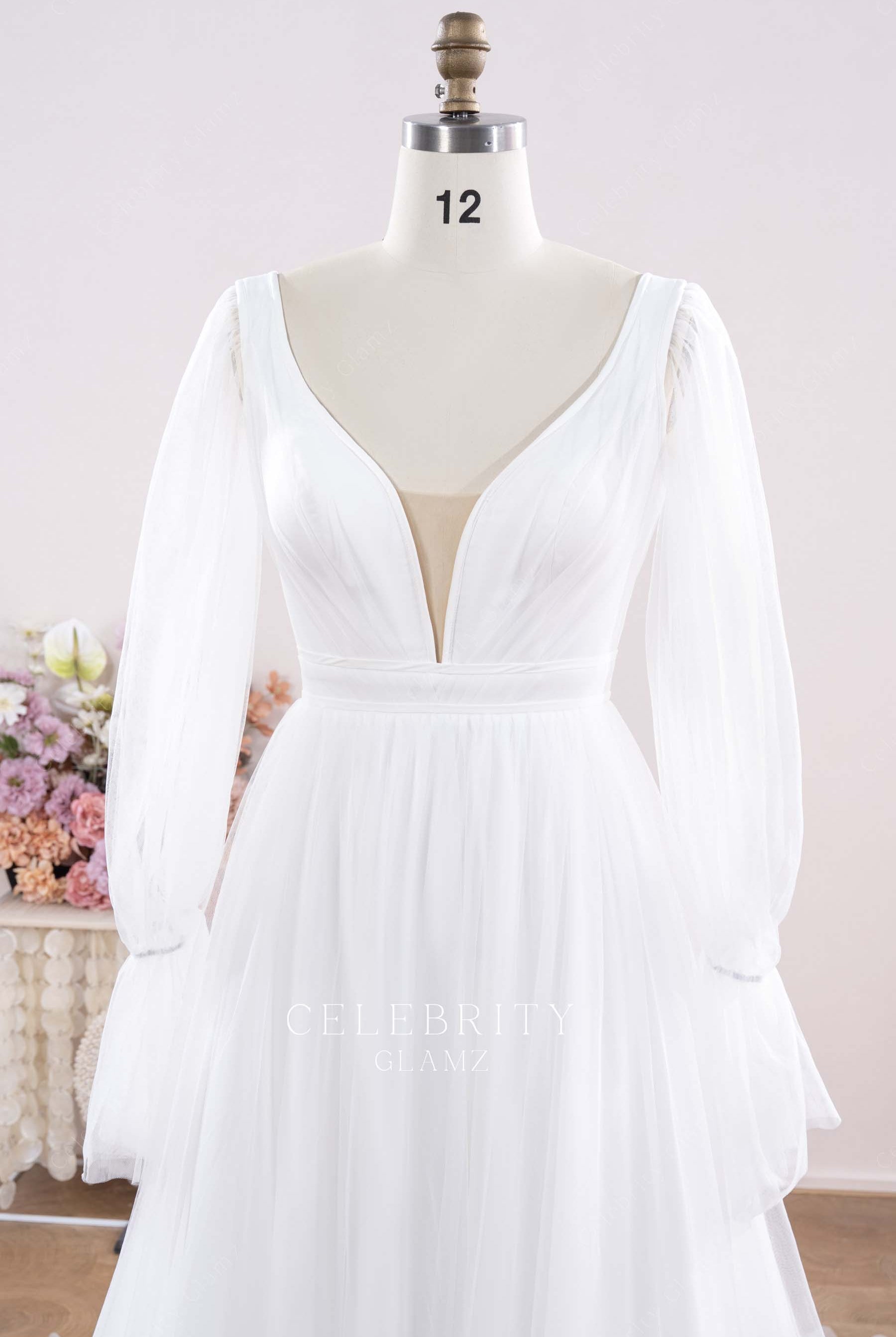 white tulle plunging neck wedding dress