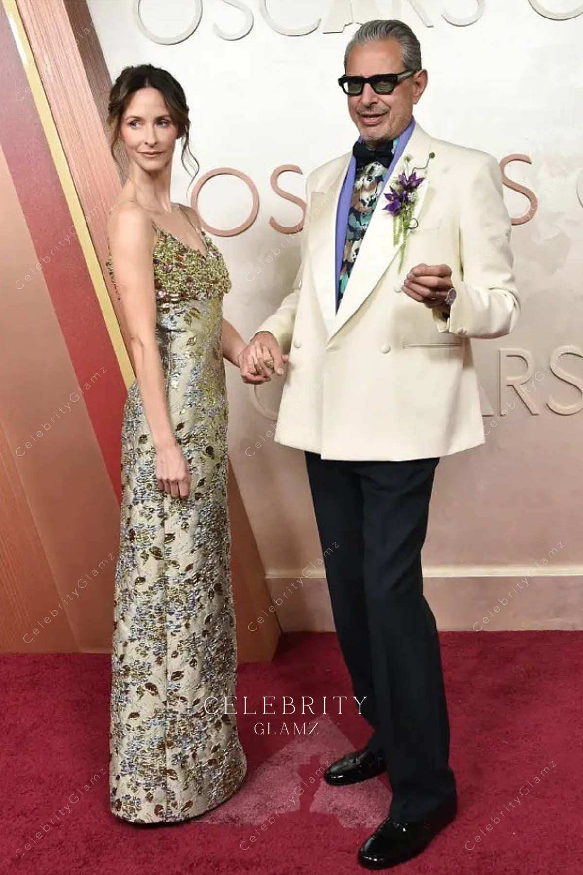 2025 Oscars red carpet Emilie Livingston taupe sleeveless dress