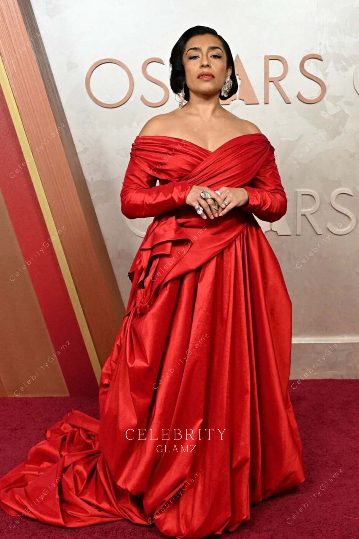 Adriana Paz pleated v neck 2025 Oscars red carpet dress