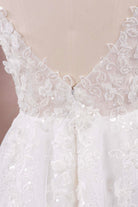 alluring deep v back bridal gown