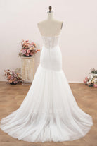 asymmetrical mermaid court train bridal dress