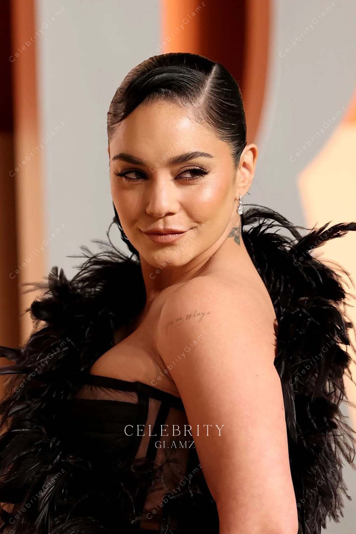 asymmetric neck Vanessa Hudgens 2025 Vanity Fair party dress