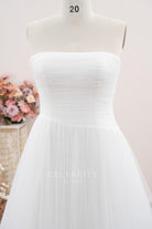 asymmetrical waistline wedding dress