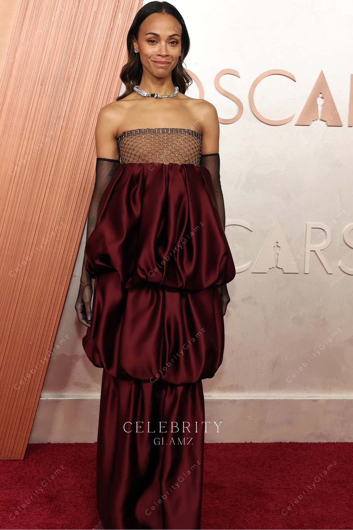 burgundy Zoe Saldaña 2025 Oscars red carpet prom dress