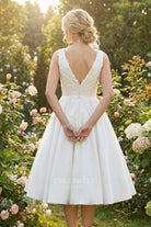 buttoned v back wedding dress