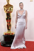 Charlize Theron fit flare formal dress 2024 Oscars red carpet