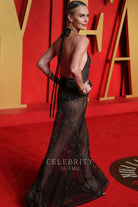 Charlize Theron glitter open back prom dress 2024 Oscars after party