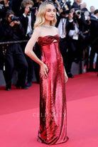 Chloe Fineman burgundy floor length prom dress Cannes film festival red carpet 2024