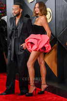 Chrissy Teigen ruffled mini dress Grammys red carpet 2024